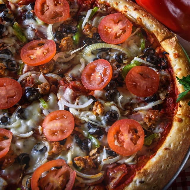Big Wheel (House Combo) Pizza.