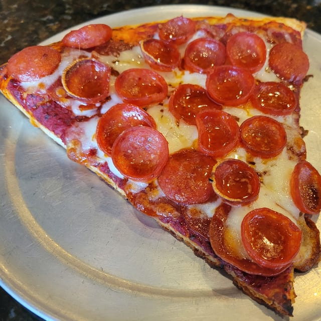 The Hot Honey Magnifico Slice.